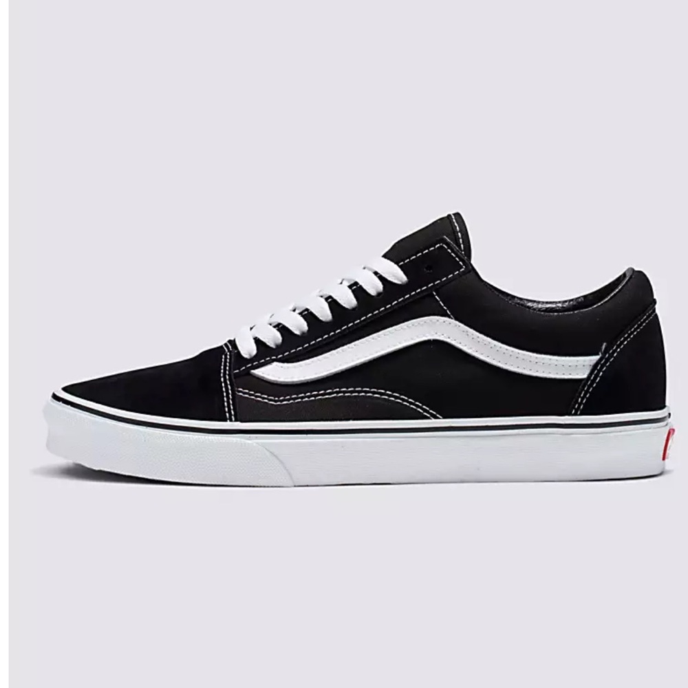 Black and white “Old Skool” vans.
